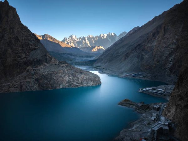Aerial Drone View of Attabad lake in a beautiful autumn season at Passu Karakoram mountains range in Pakistan.